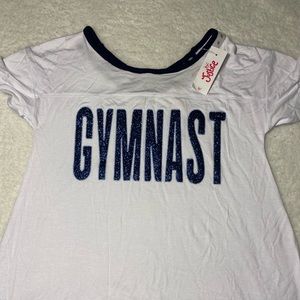 🐼 Justice white “Gymnast” shirt